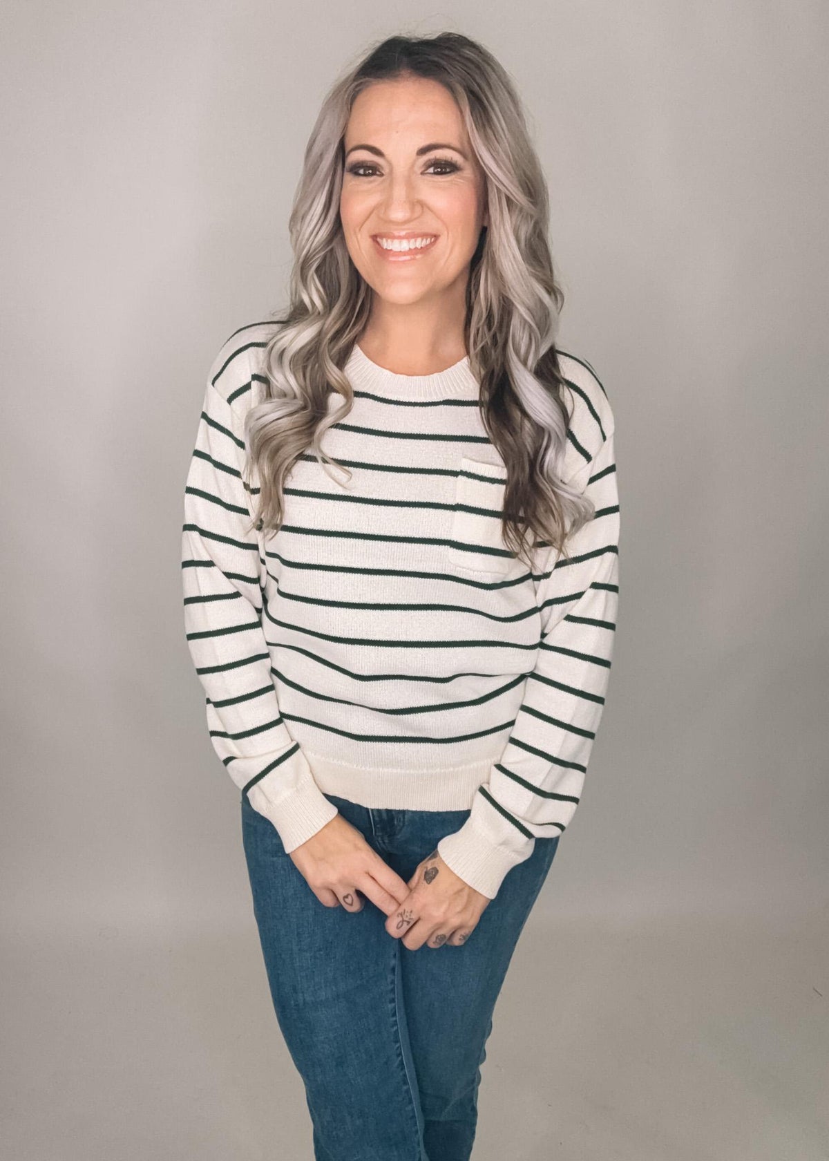 Cream Pocket Sweater with Green Stripes
