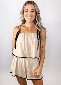 Nude Romper with Black Trim