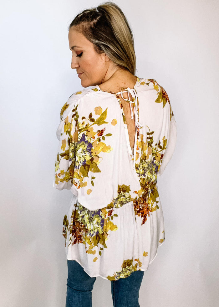 Ivory Floral Peplum with Tie Back Detail